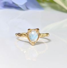 ✨ December 1st is the CUT-OFF DATE to order your piece to receive it in time for the Holidays If you place your order After December 1st, you will need to upgrade the shipping method with FedEx Express at checkout in order to receive it by Christmas.✨ Show your special Love with our delicate Moonstone ring. Handcrafted in wax and cast in your choice of Solid Sterling Silver or Solid 14k Gold, our ring features a stunning Pear shape rainbow Moonstone - also the birthstone for June - and artfully Untreated Recycled Gold Jewelry As A Gift, Untreated Recycled Gold Jewelry Gift, Delicate Hand Forged Ring As A Gift, Recycled Gold Untreated Jewelry As A Gift, Delicate Hand Forged Rings As Gift, Hand Forged Moonstone Jewelry For Anniversary, Anniversary Hand Forged Moonstone Jewelry, Handmade 14k Gold Moonstone Ring For Anniversary, Hand Forged Moonstone Ring For Wedding