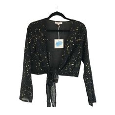 Brand: Cloud Ten New With Tags Size: S Color: Black/Gold Material: 100% Polyester Features: - Cropped Fit - Long Sleeves - Tie Front - Stars Pattern - Sheer Fitted Star Print Top For Night Out, Fitted Star Print Tops For A Night Out, Fitted Star Print Tops For Fall, Fitted Tops With Star Print For Fall, Summer Tops With Star Print For Night Out, Black Star Print Top For Spring, Black Star Print Tops For Spring, Black Tops With Star Print For Spring, Star Print Tops For Night Out In Spring