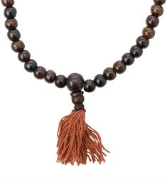 Malas are Tibetan rosaries, traditionally used for special Buddhist practice. Because Tibetan Buddhism suggests that there are 108 negative emotions to overcome, malas such as this Bone Counter Japa Mala are strung with 108 beads, one bead for each mantra. Features: Strung bone beads. Finished with a cotton tassel ends and bone beads. Use for meditation or spiritual practice. Details: Designed In: Nepal Material(s): Bone Dimensions: 28" Keywords: japa, japa mala, malas, rosary, bone, Nepal, medi Bohemian Mala With 108 Beads For Blessing, Bohemian 108 Beads Mala For Blessing, Hand-strung Spiritual Beads For Blessing, Spiritual Mala With 108 Beads For Blessing, Brown Spiritual Beads For Meditation, Spiritual Wooden Beads Mala For Meditation, Spiritual Wooden Beads Jewelry For Meditation, Adjustable Bohemian Mala For Blessings, Bohemian Mala With 8mm Beads For Blessing