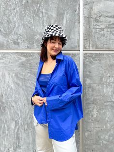 A closet staple in a gorgeous blue color! The It's Go Time top is an oversized button down that can be worn many ways for all seasons! Need a summer bathing suit cover up? You got it. Need a casual fall layering piece with a pop of color? You got it. True to size with an oversized fit. Model is 5'7 wearing size small. 100% Cotton Seen styled with: Silver Metallic Jeans https://www.aspynandivy.com/products/silver-metallic-jeans-extended-sizes?_pos=4&_sid=6924b3eed&_ss=r *All measurements in inche Summer Bathing Suits, Metallic Jeans, Fall Layering, Bathing Suit Cover, Gogo Boots, Bathing Suit Covers, Fall Layers, Bathing Suit Cover Up, Neutral Outfit