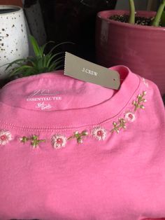 Unlike the real cherry blossoms, these will remain in peak bloom any time you wear this t-shirt! Details: -JCrew Size S cotton tee ( its a loose fitting size small!) -Care: Machine wash inside out in cold water,tumble dry on low if needed Pink Embroidered Cotton T-shirt, Spring Crew Neck Tops With Floral Embroidery, Pink T-shirt With Embroidered Text For Summer, Pink Embroidered T-shirt For Summer, Pink Crew Neck T-shirt With Embroidered Graphics, Pink Embroidered T-shirt, Spring Everyday Crew Neck T-shirt, Everyday Crew Neck T-shirt For Spring, Pink Summer Top With Embroidered Text