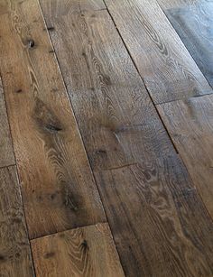 an image of wood flooring that looks like it has been made from old planks