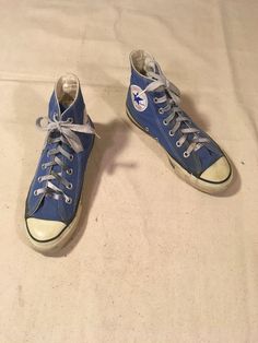 "1980s Converse Chuck Taylor All Star hi-top sneakers made in USA blue label on insole cornflower blue canvas rubber sole (white/dark blue line) cushion insole w/arch support good vintage condition, light wear missing instep rivet/glue bleed above sole guard/laces wear/heel/sole wear(see photos) label size 4 1/2, equivalent to women's 6 to 6 1/2, please go by measurements measurements, insole-9 1/2\" sole-10\" width-3 1/2\" heel-1 1/4\" height-5 1/2\"" Vintage Lace-up Sneakers With Rubber Toe Cap, Retro Blue Mid-top High-top Sneakers, Retro Blue High-top Sneakers, Blue Retro High-top Sneakers, Retro Cotton High-top Sneakers With Round Toe, Vintage Mid-top Sneakers With Rubber Sole, Vintage Blue Sneakers For Streetwear, Retro Mid-top Cotton Canvas Shoes, Retro Cotton Mid-top Canvas Shoes