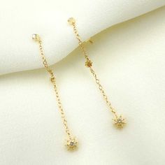 14K Solid Gold and Diamonds Stars Dangle Earrings HIGH QUALITY DANGLE EARRINGS This modern and on-trend design is crafted from genuine 14k Solid Gold and Diamonds! Item number: GDT60-EFB51689 Length Size: 36mm Thickness: 1.7mm Closure: Butterfly Metal: 14k Solid Gold Purity: 14K (Stamped for Authenticity) Processing time: 1-2 business days FAST SHIPPING Gold Jewelry Store NY sells only authentic solid 14K Gold. We do not sell gold plated or gold-filled jewelry. They are unique and pair perfectly Elegant Dangle Earrings With Star Charm, Elegant Yellow Gold Earrings With Star Charm, Elegant White Gold Earrings With Star Charm, Elegant Star-shaped Jewelry With Dangling Charms, Earrings Star, Gold Jewelry Stores, Jewelry Chain, Earrings Diamond, Sell Gold