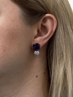 Pair of 18k gold Pomellato Nudo earrings, with amethyst and approx. 0.90ctw G/VS diamonds. Brand new, old stock. Just purchased inventory of a high end boutique in Europe. All retail prices displayed on the items are from the early 2000s. Current retail prices are significantly higher. DESIGNER: Pomellato MATERIAL: 18k Gold GEMSTONES: Diamond, Amethyst DIMENSIONS: Earrings are 23mm x 12.5mm. MARKED/TESTED: Pomellato, 750. WEIGHT: 19.5 grams CONDITION: Brand New/ Store Sample Luxury Amethyst Earrings For Formal Occasions, Luxury Purple Earrings For Evening, Elegant Amethyst Earrings For Formal Occasions, Luxury Purple Earrings For Anniversary, Amethyst Earrings Fine Jewelry For Formal Occasions, Formal Purple Diamond Earrings, Formal Amethyst Gemstone Earrings, Elegant Purple Jewelry With Pave Setting, Amethyst Gemstone Earrings For Formal Occasions