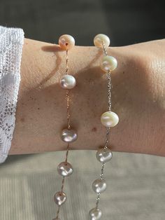 Item Specifications Handmade White Gold , Rose Gold Stone: Pearl This beautiful Pearl Bracelet is super pretty. This would make a beautiful gift for someone you love. Light and easy to wear all day long! These Pearls are fresh water pearls ,available in 14k white and rose gold Gemstone: Fresh Water Pearl Color : White or Natural Pink Size : 6-6.5mm Potato Chain : 14k twisted chain 0.90mm thick Metal : 14k solid gold Bracelet Length : 7.5" long Closure : Spring Clasp Country of Manufacture ------ Elegant Luxury Hand-strung Pearl Bracelet, Elegant Pink Chain Bracelet With Adjustable Chain, Minimalist Single Strand Rose Gold Jewelry, Minimalist Rose Gold Bracelet With Strap, Minimalist Rose Gold Single Strand Jewelry, Delicate Single Strand Bracelets For Gifts, Delicate Single Strand Bracelets As Gift, Delicate Single Strand Bracelet Gift, Delicate Single Strand Bracelet For Gift