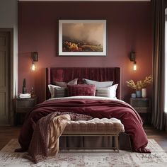 a bedroom with a large bed and red walls