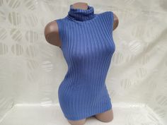 90s Vintage Women's Blue Ribbed Sleeveless Turtleneck Top. Size S-M. Top in excellent vintage condition. Bust 90cm (35.4in), top length 65cm (25.6in). Fitted Blue Tank Vest, Blue Fitted Tank Vest, Blue Sleeveless Winter Top, Blue Sleeveless Top For Winter, Fitted Blue Sweater Vest For Winter, Fitted Blue Sweater Vest For Spring, Blue Fitted Sweater Vest For Spring, Fitted Blue Sweater Vest For Summer, Blue Fitted Sweater Vest For Summer