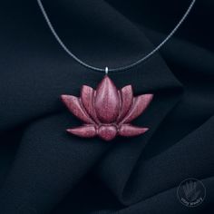 The lotus is a symbol of purity, beauty, and spiritual enlightenment.  The pendant is sized to be noticeable yet comfortable for everyday wear. It comes with a sturdy and durable cord that provides a comfortable fit and allows for adjustable length. It can be used as a personal talisman or a thoughtful gift for loved ones who appreciate inner beauty and spirituality.    [CARE] The pendant is sealed with two or more layers of wood oil in order to protect the wood against moisture and the environm Wood Necklace Pendant, Thor's Hammer Necklace, Hammered Necklace, Purple Accessories, Wooden Jewellery, Lion Necklace, Lotus Necklace, Lotus Pendant, Lion Pendant