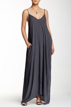 Whether you are hanging out at the pool or beach, this relaxed fitting gauze maxi dress is light enough to keep you cool on the warmest day.Fit: this style runs large, order one size down. V-neck. Adjustable spaghetti straps. V-back. 2 side seam pockets. Solid color. Crinkled woven construction. Approx. 58" length (size S-M). Imported Gauze Maxi Dress, Fashion Usa, Max Dress, Net Fashion, Light Cardigan, Dress Comfortable, Minimalist Capsule Wardrobe, Spaghetti Strap Maxi Dress, Minimalist Shoes