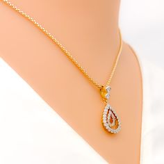 This 18k yellow gold pendant set, weighing 8.3 grams, features a dainty open drop design adorned with 1.14 carats of round brilliant cut diamonds. The diamonds, with an F-G color and VS clarity, add exceptional brilliance and elegance. The pendant measures 1 inch in length, while the matching earrings are 1.1 inches long and come with secure screw back posts. Ideal for those who appreciate luxurious and sophisticated jewelry, this set adds a touch of refined charm to any collection. Its exquisit Classic Gold Diamond Drop Necklace, Gold Diamond Drop Necklace Fine Jewelry, Yellow Gold Drop Necklace With Diamond Accents, Yellow Gold Teardrop Diamond Necklace With Prong Setting, Yellow Gold Diamond Drop Necklace For Anniversary, Yellow Gold Pear-shaped Diamond Necklace With Single Cut Diamonds, Elegant Gold Drop Necklace With Brilliant Cut, Gold Pear-shaped Diamond Necklace With Brilliant Cut, Gold Diamond Cut Teardrop Pendant Necklace