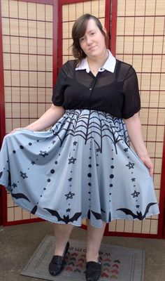 Mid-calf length goth skirt in various shades of gray with black bats, stars and spiderwebs. Very flowing and elegant, this full circle skirt is sure to impress! It has a deep pocket on either seam that can fit a large phone or wallet.  Material is a 90% polyester, 10% spandex blend. This skirt has a weave with a more matte texture, differentiating it from the shinier fabric of our skater skirts.  ~SIZING INFORMATION~ Sizing Chart and Example Sizing photos available at my studio's site here: http Witchy Skirt For Costume Party, Witchy Skirt For Halloween Cosplay, Fairy Grunge Skirt For Halloween Cosplay, Halloween Street, Goth Skirt, Goth Halloween, Mid Calf Skirt, Comfortable Skirts, Midi Skirt With Pockets