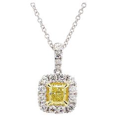 RareGemWorld's intriguing GIA certified diamond pendant. Mounted in a beautiful 18K Yellow and White Gold setting with a natural radiant cut yellow diamond. The yellow diamond is surrounded by round natural white diamond melee. This pendant is guaranteed to impress and enhance your personal collection. Total Weight: 0.74cts Natural Fancy Yellow Radiant Cut Diamond Measurements: 4.28 x 3.64 x 2.75 mm Weight: 0.43cts Clarity: VS1 Natural Round White Diamonds 18K Yellow/White Gold All diamonds are guaranteed natural International Shipments: Please note that customers are responsible for all import duties and taxes applicable to the country of shipment Returns: Returns accepted in original format within 14 days of receipt Do not forget to view our entire inventory! Thank you for reviewing our White Gold Set, Radiant Cut Diamond, Radiant Diamond, Radiant Cut, Yellow Diamond, Drop Pendant, Gia Certified Diamonds, White Diamonds, Diamond Pendant