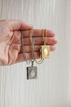 For our book lovers👀 This locket is a fully functional locket, so it opens and closes and you can add any keepsakes or photos inside to make it all the more meaningful! This necklace is made of 18k gold plated stainless steel and is completely tarnish proof and high quality, so you know that means it's hypoallergenic and nickel free! This is the perfect gift for all our book lovers, writers, and academia girlies! This locket comes in with a 20 inch necklace chain. 20 Inch Necklace, Book Locket, Hair Accessories Jewelry, Cuff Earrings, Necklace Chain, Ring Bracelet, Locket, Writers, Chains Necklace