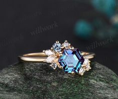 - Metal: Solid gold(10K/14K/18K white/yellow/rose gold),925 sterling silver,platinum available- Main Stone: 6mm hexagon cut lab alexandrite.- Accent Stone: lab alexandrites and moissanites or diamonds(G-H,Clarity SI-VS)- Band Width: 1.4mm- Can be personalized: Yes Trillion Earrings, Engagement Ring Cluster, Ring Cluster, Alexandrite Engagement Ring, Alexandrite Ring, Bridal Ring Sets, Unique Gemstones, Bridal Ring, Mens Wedding Rings