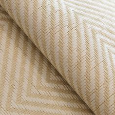 a close up shot of the textured fabric in beige and white tones, which is very soft