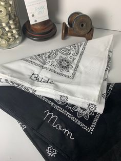 NKDs Exclusive Embroidered Name or Initials on Bandanna with Hand-Stitched Machine Font Monogram. How lovely to have your personalization on the corner edge rim of this approx 22 x 22 wonderful double printed designed bandanna. You will get one name or initials in a machined hand-stitched font in the color of the thread of your choice. Fonts available to choose from: Block Cursive/Script As always, if no thread color is specified at checkout, your order will be filled as the designer chooses. Th Traditional White Cotton Bandana, Brides Mom, Bride Headband, Cursive Script, Baby Banners, Embroidered Name, Embroidered Gifts, Hand Stitch, Wedding Bridesmaid