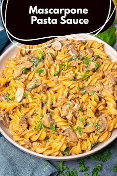 mushroom pasta with mushrooms and parsley in a white bowl