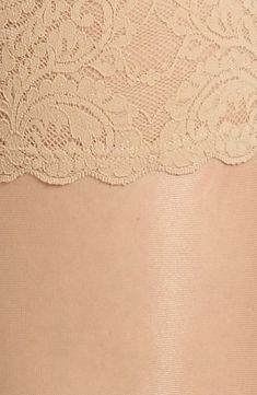 These smooth, soft stockings have a sophisticated matte finish and stay put with grippy lace bands. 87% polyamide, 13% elastane Machine wash cold, line dry Made in Austria Hosiery Elegant Tight Legwear With Lace Trim, Elegant Fitted Hosiery With Lace Trim, Elegant Fitted Legwear With Lace Trim, Stretch Lace Stockings With Lace Trim, Elegant Stretch Stockings With Lace Trim, Elegant Stretch Lace Trim Hosiery, Elegant Fitted Stockings With Lace Trim, Elegant Fitted Tights With Lace Trim, Sheer Fitted Lace Hosiery