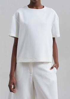 Sierra Tee - White – The Frankie Shop Chic Summer T-shirt For Workwear, Chic Crew Neck Cropped T-shirt For Summer, Chic Cropped T-shirt For Spring, White Fitted Crop Top With Cropped Hem, Fitted White Cropped Top, Spring Boxy Tops For Workwear, White Fitted Top With Cropped Hem, Spring Boxy Workwear Tops, Fitted White Top With Cropped Hem