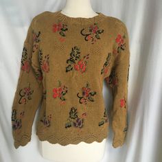 Vintage 90's Gold Sweater with Scalloped Crocheted Trim is by Cambridge Dry Goods. Sweater with shoulder pads ( easily snipped out if desired) has rounded neckline w/ pretty knitted detail and shows a gorgeous embroidered floral pattern in vibrant red, olive green and purple! Sweater is trimmed in scalloped crochet along bottom and at cuffs. Size label states a US ladies small. Please check measurements below for proper fit. Very Good Vintage Condition  Materials : 55% Ramie, 45% Cotton  Size : Vintage Long Sleeve Stretch Sweater, Vintage Embroidered Fall Sweater, Retro Embroidered Crew Neck Sweater, 90s Embroidered Winter Tops, Vintage Brown Sweater For Spring, Fitted 90s Crew Neck Sweater, Fitted Crew Neck Sweater 90s Style, 90s Fitted Crew Neck Sweater, Vintage Embroidered Crew Neck Sweater