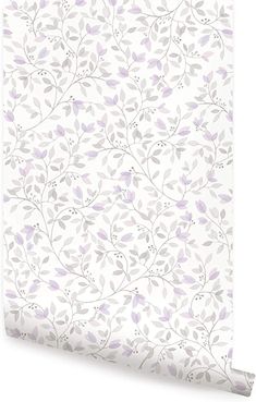 a white and purple wallpaper with leaves on it