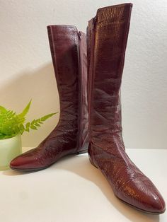 "80s crinkle patent leather boot hits just below the knee in front, slightly lower (1/2\") in back. Super low wood heel, 1/2\" high. Zipper closure on inside of leg. Rich maroon red color looks great with black, grey, camel, cream. Purchased in 2018 on New York buying trip. Comfy, cute option for Fall through Winter wardrobes, and holiday outfits! Best way to compare measurements is to check width and length of a similar pair of shoes you own that fit comfortably. I measure width on outside bott Maroon Red Color, Low Heel Boots, Vintage Swimsuit, Patent Leather Boots, Inside Shoes, Italy Vintage, Vintage Versace, Heel Boot, Wood Heel