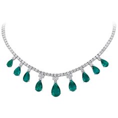 An Elegant Necklace Set with 9 Emeralds weighing 20.43 Carats and 17.74 Carats of Diamonds. Set in 18 Karat White Gold. Measures 16 inches. Complete Suite available, please inquire. 1stdibs Jewelry, Emerald And Diamond Necklace, Radiant Cut Diamond Ring, Diamond Drop Pendant, Pear Shaped Diamond Ring, Emerald Necklace Pendant, Jewelry Emerald, Sapphire And Diamond Earrings, Pear Cut Engagement Rings