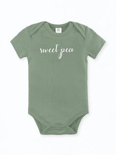 100% Organic cotton infant bodysuit in our Sweet Pea print. Tykes Corner uses certified organic baby clothing so Moms can feel at ease knowing our clothing is free of harmful chemicals and dyes. Sized 0-3, 3-6, 6-12, 12-18 months. Machine wash cold / Tumble Dry Low Remember to support small on your baby registry! Copy and paste the link or click on the Etsy icon in your Babylist app and search Tykes Corner. Green Fitted Short Sleeve Bodysuit Casual, Casual Green Short Sleeve Bodysuit, Green Cotton Bodysuit For Loungewear, Fitted Short Sleeve Organic Cotton Bodysuit, Casual Organic Cotton Fitted Short Sleeve Bodysuit, Casual Fitted Short Sleeve Organic Cotton Bodysuit, Casual Green Short Sleeve Bodysuit For Summer, Organic Cotton Short Sleeve Bodysuit For Spring, Green Cotton Onesie For Spring