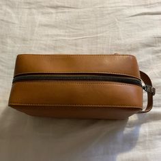 Nwt Leather Toiletry Bag - No Inner Pockets Measurements: 10 In X 5 In X 4 In Dark Tan Leather Bag For On-the-go, Brown Leather-handled Crossbody Box Bag, Versatile Brown Box Bag For Travel, Everyday Brown Rectangular Box Bag, Brown Rectangular Bag With Removable Pouch, Versatile Brown Box Bag For On-the-go, Brown Leather Box Bag With Removable Pouch, Classic Brown Box Bag For Daily Use, Versatile Rectangular Brown Box Bag