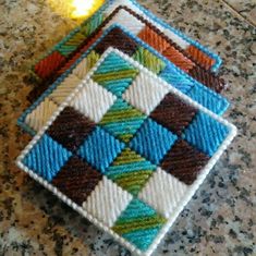 Only Here! Set Of 4 Custom, Fabric Multi Colored, Tightly Woven Knit, Square Tile, 4" X 4" Coasters. So Cute, They Are Dressing Up Your Drinks With Style And Protect Your Counter, Table And Anything Else. Awesome Gift Idea! Hama Beads Coasters, Canvas Coasters, Plastic Canvas Books, Yarn Ideas, Crochet Purse Pattern Free, Plastic Canvas Coasters, Loom Knitting Projects, Purse Pattern, Canvas Work