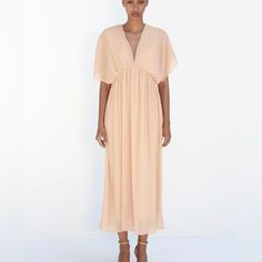 Nwt Large Chic Flowy Midi Dress For Daywear, Elegant Beige V-neck Dress For Day Out, Feminine Maxi Length Lined Dress, Chic Long V-neck Dress For Summer, Chic Long Summer V-neck Dress, Flowy V-neck Midi Dress For Evening, Chic Lined Dresses For Daywear, Flowy Lined Midi Dress For Casual Wear, Flowy Lined Midi Dress For Casual Occasions