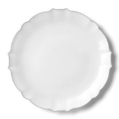 an empty white plate on a white background