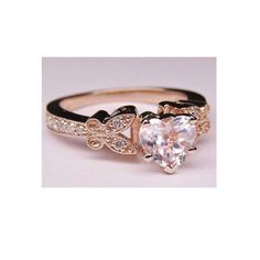 Heart Shape Diamond Butterfly Vintage Engagement Ring In 14k Pink Gold - GIA Certified Center Diamond: Shape: Heart Shape Diamond Carat Weight: 1.03 Carat Color: F - White Colorless Clarity: SI1 Depth:57% Table: 62% Measurements: 5.97 x 7.09 x 4.04 mm Cut grade: Very Good Polish: Excellent Symmetry: Very Good Certified byGIA # 2207114958 Stock number: SNG2 Side Diamonds: Shape: Round Brilliant Cut Diamonds Number of Stones: 14 Total Carat Weight: 0.16 ct. Color, Clarity: G-H(White), Eye Clean(SI Gia Certified Heart Diamond Rings, Gia Certified Heart Shaped Fine Jewelry Ring, Elegant 14k Gold Butterfly Ring For Anniversary, Gia Certified Heart Shaped Anniversary Ring, Gia Certified Heart-shaped Ring For Anniversary, Heart-shaped Gia Certified Ring For Anniversary, Luxury Rose Gold Diamond Ring For Valentine's Day, Luxury Heart Cut Gia Certified Jewelry, Luxury Gia Certified Heart Cut Jewelry