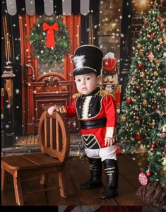 -Introducing the Nutcracker Boy Costume! 🎭👑 Transform your little one into a whimsical character from the enchanting world of holiday festivities. This charming costume features a classic red and gold jacket adorned with intricate details, mimicking the iconic nutcracker soldier look. Also, the little prince will shine like a star in Halloween with this outfit. -🎄👦 Complete with a faux-fur-trimmed hat and smartly tailored pants, this ensemble brings the magic of the Nutcracker ballet to life English Soldier, Costume Photoshoot, Suit Halloween Costume, Soldier Costume, Tin Soldier, Nutcracker Soldier, Gold Jacket, 1st Birthday Gifts, Boy Costumes