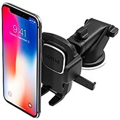 an iphone is attached to a car holder