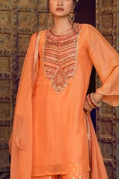 Shop for Supria Munjal Orange Organza Embroidered Kurta Palazzo Set for Women Online at Aza Fashions Orange Dupatta With Intricate Embroidery For Reception, Orange Embroidered Sets For Reception, Orange Sharara With Intricate Embroidery For Reception, Orange Intricate Embroidered Sharara For Reception, Orange Embroidered Sharara For Reception, Orange Festive Set With Intricate Embroidery, Embroidered Orange Traditional Wear For Reception, Orange Diwali Sets With Intricate Embroidery, Orange Chanderi Sharara For Reception