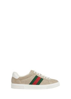 "Find GUCCI Ace Suede Monogram Low-top Sneakers on Editorialist. Gucci \"Ace\" low-top sneakers in GG monogram suede Flat heel; 1.2\"H Round toe Lace-up vamp; branded metal tag Leather backstay with logo lettering Iconic red and green web on the sides Rubber outsole Additional pair of laces included Made in Italy" Sporty Gucci Sneakers With Embossed Logo, Casual Gucci Sneakers With Embossed Logo, Sporty Beige Sneakers With Logo, Beige Lace-up Sneakers With Logo, Beige Logo Sneakers For Streetwear, Beige Sneakers With Embroidered Logo For Streetwear, Beige Embroidered Logo Sneakers For Streetwear, Gucci Custom Lace-up Logo Sneakers, Gucci Sporty Custom Sneakers With Logo