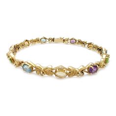 Precious Metal: 14 Karat Yellow Gold Type of Clasp: Custom Box Lock Gemstone: Diamonds (Round) [0.10 Carats] Aquamarine (Oval) Yellow Topaz (Oval) Amethyst (Oval) Peridot (Oval) Width: 6.4 mm* Length: 8 Inches* (End to end) Weight: 14.6 grams* *All weights and measurements are approximate. Please contact us if you have further questions about alternate sizes or styles, availability, specifications, and personalization options. Elegant Multicolor Diamond Bracelet For Formal Occasions, Elegant Multicolor Multi-stone Gold Bracelet, Elegant Multicolor Gold Bracelet For Formal Occasions, Elegant Multicolor Gold Bracelet For Formal Events, Marquise Yellow Gold Bracelets For Formal Occasions, Formal Yellow Gold Diamond Bracelet With Marquise Shape, Formal Yellow Gold Marquise Diamond Bracelet, Yellow Gold Oval Bracelet With Multi-stone, Yellow Gold Multi-stone Oval Bracelets