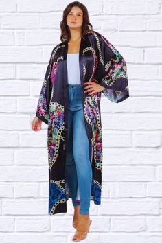 Introducing our FASHION KIMONOS COVER UP - a timeless piece of summer elegance. The black print with cerise pink paisley adds an elegant and chic touch to any outfit. Elevate your style with this exclusive piece. maxi kimonos, long sleevesModel size small 5'9" 32-25-35 Dress 2 Bust 52 inches, Length 55 inches Fabric Contents: 100% POLYESTER Spring Floral Print Fitted Kimono, Fitted Floral Print Kimono For Spring, Elegant Fitted Summer Kimono, Chic Fitted Open Front Kimono, Fitted Open Front Kimono For Spring, Fitted Spring Vacation Kimono, Black Summer Kimono With Kimono Sleeves, Chic Fitted Kimono With Kimono Sleeves, Fitted Casual Kimono With Kimono Sleeves