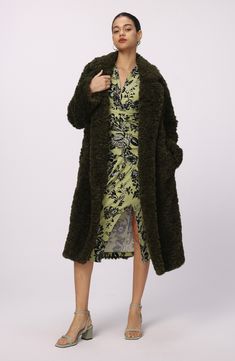 Shaggy faux fur keeps this coat firmly planted in the totally fabulous section of your outerwear collection. Double-breasted button closure Notched lapels Side-seam pockets Lined 100% polyester faux fur Dry clean Imported Chic Long Faux Fur Coat, Faux Fur Coat For Workwear, Fur Coat With Faux Fur Lining For Work, Chic Faux Fur Coat With Pockets, Chic Faux Fur Coat For Work, Long Fur Coat With Faux Fur Trim For Work, Long Fur Coat With Faux Fur Trim, Nordstrom Store, Anniversary Sale