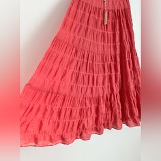 Max Studio Boho Maxi Skirt In Size S. The Skirt Is Made Of 97% Cotton And Comes In A Stunning Coral Color. It Features A Layered Design With An Elastic Waist, Making It Easy To Wear. Perfect For Any Occasion, Whether You're Traveling, Going To A Party, Or Just Running Errands. This Skirt Is Lightweight And Fully Lined, Ensuring Your Comfort Throughout The Day. The Pull-On Closure And Full Length Of The Skirt Make It Versatile And On-Trend. Made In China, This Skirt Is A Must-Have For Any Bohemia Red Tiered Maxi Skirt With Elastic Waistband, Red Gathered Maxi Skirt For Summer, Red Relaxed Maxi Skirt For Vacation, Relaxed Red Maxi Skirt For Vacation, Red Relaxed Fit Maxi Skirt For Vacation, Relaxed Red Maxi Skirt For Beach, Red Beach Midi Skirt, Red Midi Skirt For Beach, Red Flowy Casual Skirt