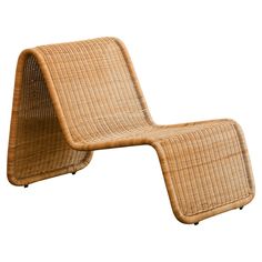 an outdoor lounge chair made out of wicker