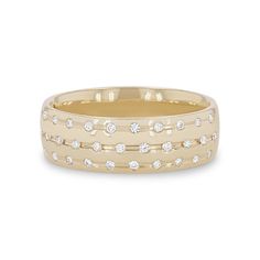 a yellow gold wedding band with diamonds