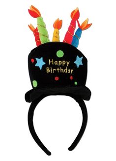 a birthday hat with candles and stars on the top is decorated in black felt, which says happy birthday