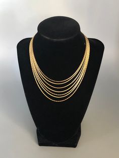 Art Deco style multi-strand chain Winnard Company necklace. Winnard Company, located in New York NY, was a small jewelry company that produced exquisite gold filled jewelry in very limited editions, and sold them in jewelry boutiques. Winnard is collectible, high quality jewelry.  This piece is in excellent condition showing just a bit of wear at the clasp.  It is 12K gold filled.  The chains are beautiful, supple and soft against the skin.  This is a small necklace, so please check measurements Gf Necklace, Chain Art, Multi Chain Necklace, Layered Chain, Small Necklace, Necklace Layered, Layered Chains, Art Deco Stil, Art Deco Necklace