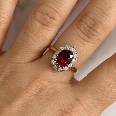 This romantic vintage 2.20ct. oval tourmaline ring is set in 18K Yellow Gold and White Gold. It has a 0.50cttw. halo of diamonds. Oval Ruby Ring With Rose Cut Diamonds, Classic Oval Ruby Ring With Halo Setting, Vintage Oval Halo Setting Wedding Ring, Vintage Oval Ruby Ring With Halo Setting, Palm Beach Fl, Tourmaline Ring, West Palm Beach, West Palm, Pink Tourmaline