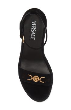 Versace throws it back to the '90s with this ankle-strap sandal branded with Medusa '95 hardware and grounded by a jute-wrapped wedge and platform. 4 1/2" (114mm) heel (size 38.5) 2" platform; 3 1/2" strap height Adjustable ankle strap with buckle closure Leather upper and lining/rubber sole Made in Spain Designer Shoes Luxury Wedge Sandals With Buckle Closure, Luxury Open Heel Wedge Sandals With Heel Strap, Luxury Wedge Heel Sandals With Heel Loop, Luxury Wedge Sandals With Block Heel And Heel Strap, Luxury Wedge Sandals With Heel Strap And Block Heel, Designer Wedge Heels With Buckle Closure, Luxury Wedge Sandals With Ankle Strap And Removable Insole, Luxury Wedge Sandals With Ankle Strap And Heel Loop, Versace Gold