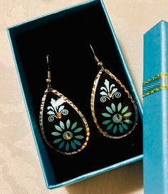 Elegant, handcrafted, cooper engraved Turkish earrings.  These Turkish handmade earrings are a perfect gift for someone special. Crafted from high-quality copper, they feature an intricate engraving that adds a touch of beauty to any outfit. The earrings are perfect for those who appreciate unique and exquisite jewelry pieces. The earrings are designed with a focus on beauty and elegance, making them a great addition to any jewelry collection. The engraved design adds a touch of sophistication to the overall look, making them perfect for both casual and formal occasions. These earrings are sure to impress and make a great statement piece. Traditional Rose Gold Earrings For Gift, Handmade Artistic Copper Earrings, Artistic Etched Jewelry For Gifts, Artistic Handmade Copper Earrings, Artistic Silver-colored Copper Earrings, Artistic Silver Copper Earrings, Artistic Metal Earrings As Gift, Artistic Metal Earrings For Gift, Teardrop Copper Jewelry Gift