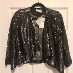 Nwt! Purchased This Black Sequin Blousy/Flowy Jacket At Lord & Taylor And It's Never Been Worn. In Perfect Condition! This Blazer/Jacket Has A Flattering Float Fit With 3/4 Sleeves. Perfect For The Holiday Parties And New Years Eve! Fall Evening Sequined Outerwear, Chic Outerwear For Workwear And Party Season, Chic Outerwear For Work And Party Season, Winter Sequined Outerwear, Winter Evening Outerwear With Sequins, Chic Holiday Outerwear With Sequins, Chic Holiday Sequin Outerwear, Black Holiday Outerwear, Holiday Night Out Long Sleeve Outerwear